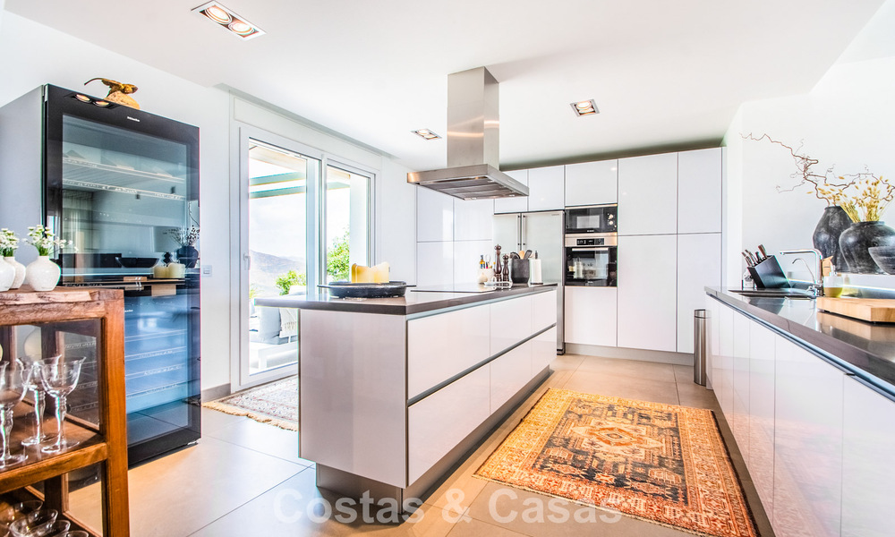 Contemporary Mediterranean luxury villa with panoramic mountain and sea views for sale in East Marbella 776883