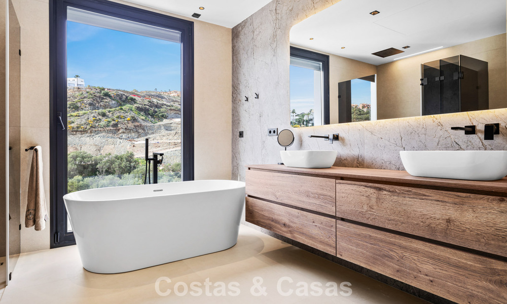 Move-in ready villa with modern architecture for sale in a secure residential area of Marbella - Benahavis 777150
