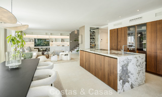 Move-in ready duplex penthouse for sale in a 24-hour security urbanization on Marbella’s Golden Mile 777104 