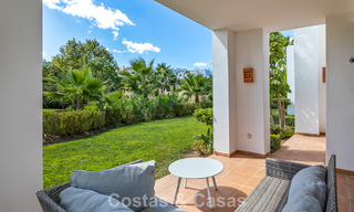 Garden apartment for sale in an exclusive complex near a large blue lagoon on the Costa del Sol 777430 