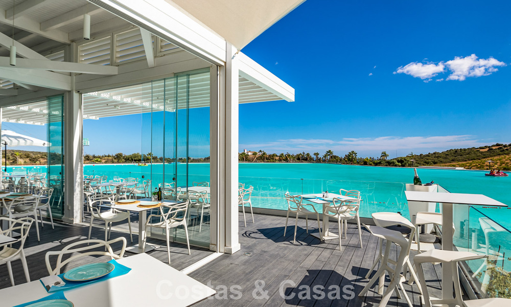 Garden apartment for sale in an exclusive complex near a large blue lagoon on the Costa del Sol 777431