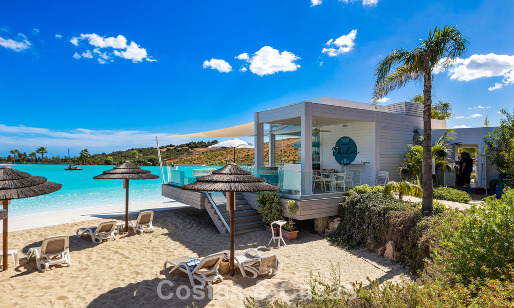 Garden apartment for sale in an exclusive complex near a large blue lagoon on the Costa del Sol 777432