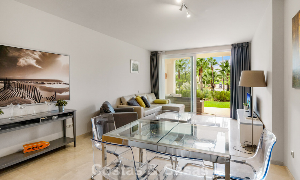 Garden apartment for sale in an exclusive complex near a large blue lagoon on the Costa del Sol 777435