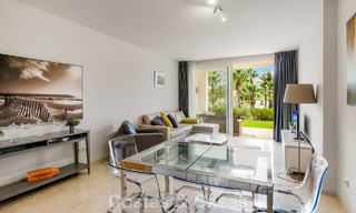 Garden apartment for sale in an exclusive complex near a large blue lagoon on the Costa del Sol 777435 