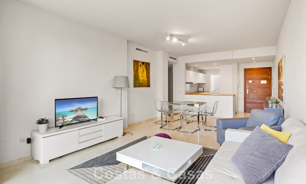 Garden apartment for sale in an exclusive complex near a large blue lagoon on the Costa del Sol 777436