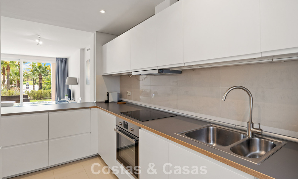 Garden apartment for sale in an exclusive complex near a large blue lagoon on the Costa del Sol 777437
