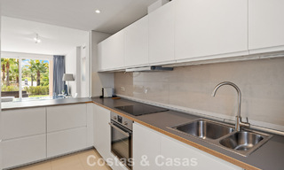 Garden apartment for sale in an exclusive complex near a large blue lagoon on the Costa del Sol 777437 