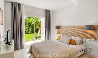 Garden apartment for sale in an exclusive complex near a large blue lagoon on the Costa del Sol 777439 