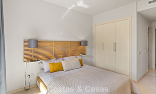 Garden apartment for sale in an exclusive complex near a large blue lagoon on the Costa del Sol 777440 