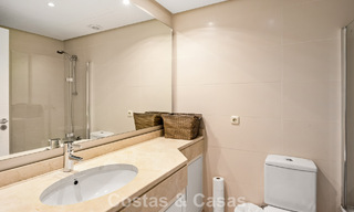 Garden apartment for sale in an exclusive complex near a large blue lagoon on the Costa del Sol 777442 