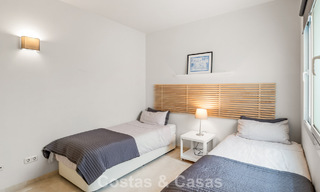 Garden apartment for sale in an exclusive complex near a large blue lagoon on the Costa del Sol 777443 