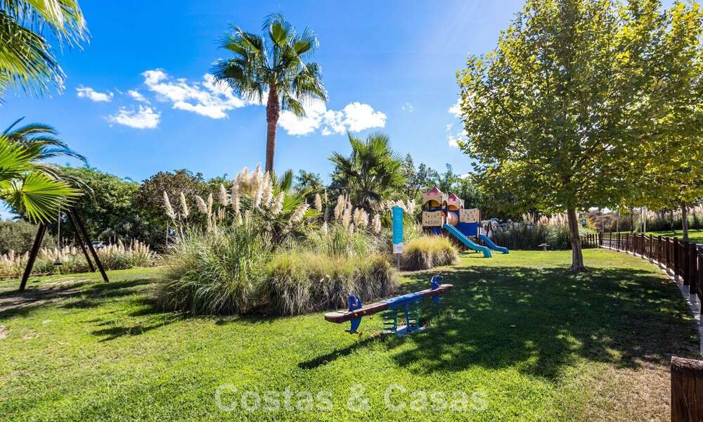 Garden apartment for sale in an exclusive complex near a large blue lagoon on the Costa del Sol 777445