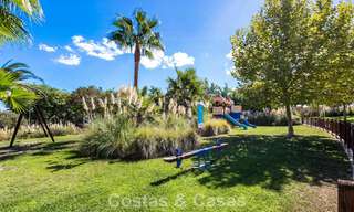 Garden apartment for sale in an exclusive complex near a large blue lagoon on the Costa del Sol 777445 