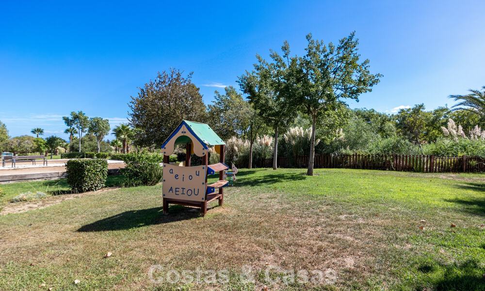 Garden apartment for sale in an exclusive complex near a large blue lagoon on the Costa del Sol 777446