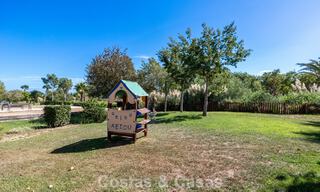 Garden apartment for sale in an exclusive complex near a large blue lagoon on the Costa del Sol 777446 