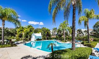 Garden apartment for sale in an exclusive complex near a large blue lagoon on the Costa del Sol 777447 