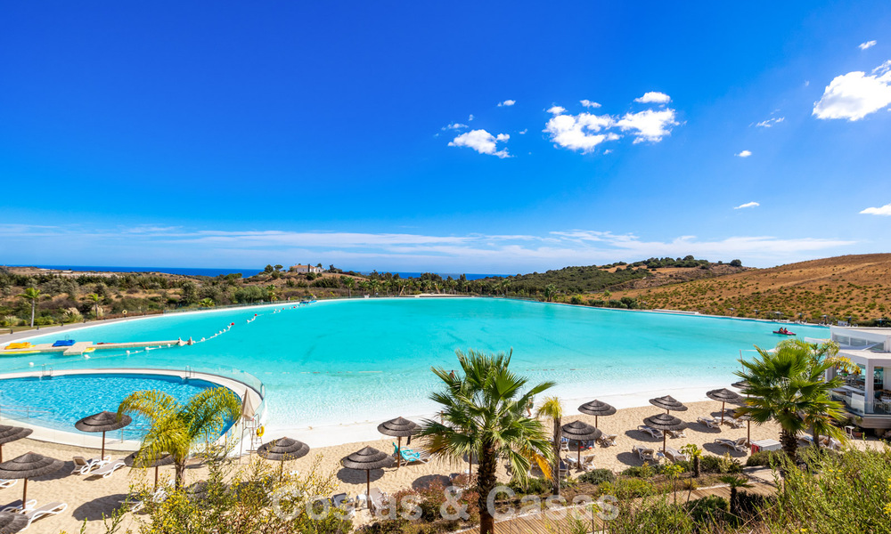 Garden apartment for sale in an exclusive complex near a large blue lagoon on the Costa del Sol 777448