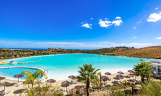 Garden apartment for sale in an exclusive complex near a large blue lagoon on the Costa del Sol 777448 