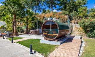 Garden apartment for sale in an exclusive complex near a large blue lagoon on the Costa del Sol 777450 