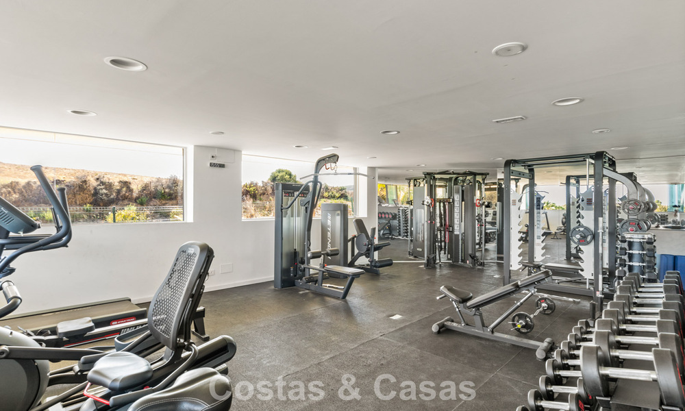 Garden apartment for sale in an exclusive complex near a large blue lagoon on the Costa del Sol 777451