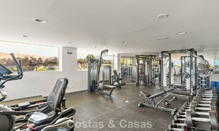 Garden apartment for sale in an exclusive complex near a large blue lagoon on the Costa del Sol 777451 