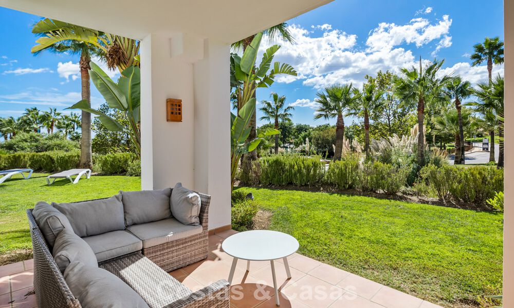 Garden apartment for sale in an exclusive complex near a large blue lagoon on the Costa del Sol 777454