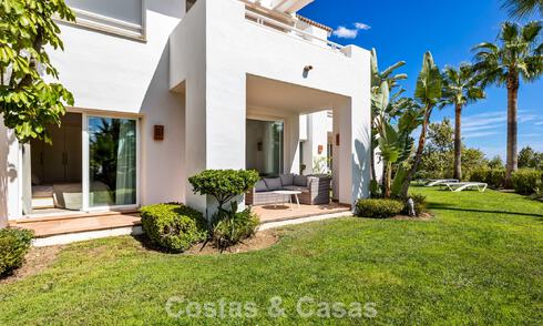 Garden apartment for sale in an exclusive complex near a large blue lagoon on the Costa del Sol 777455
