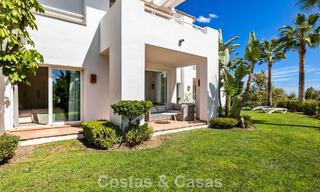 Garden apartment for sale in an exclusive complex near a large blue lagoon on the Costa del Sol 777455 