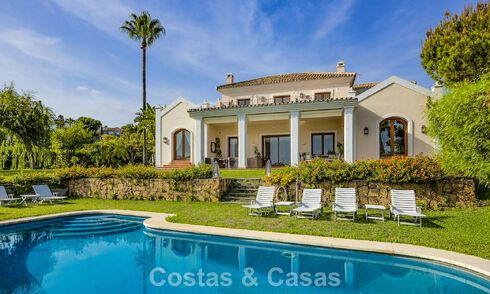 Spacious Andalusian villa with panoramic sea views for sale in a 5 star golf resort in Marbella - Benahavis 777457