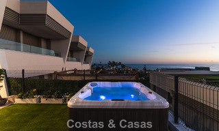 Modernist design townhouse with sea views for sale in a prestigious resort in Mijas Costa, Costa del Sol 777831 