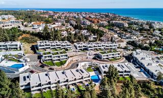 Modernist design townhouse with sea views for sale in a prestigious resort in Mijas Costa, Costa del Sol 777836 