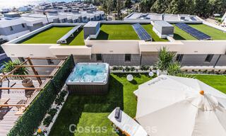 Modernist design townhouse with sea views for sale in a prestigious resort in Mijas Costa, Costa del Sol 777848 