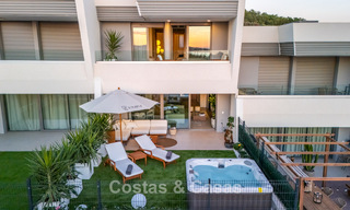 Modernist design townhouse with sea views for sale in a prestigious resort in Mijas Costa, Costa del Sol 777866 