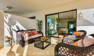 Spacious, move-in ready apartment for sale with large garden and sea views in a gated community in Benahavis - Marbella 777927 
