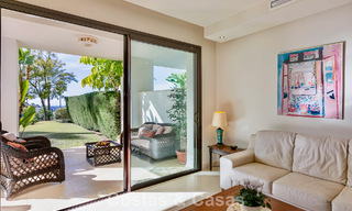 Spacious, move-in ready apartment for sale with large garden and sea views in a gated community in Benahavis - Marbella 777936 