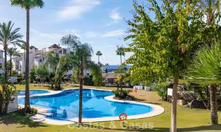 Spacious, move-in ready apartment for sale with large garden and sea views in a gated community in Benahavis - Marbella 777941 