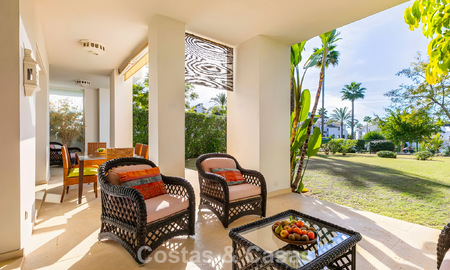Spacious, move-in ready apartment for sale with large garden and sea views in a gated community in Benahavis - Marbella 777950