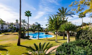 Spacious, move-in ready apartment for sale with large garden and sea views in a gated community in Benahavis - Marbella 777959 