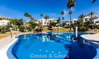 Spacious, move-in ready apartment for sale with large garden and sea views in a gated community in Benahavis - Marbella 777961 