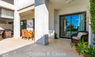Spacious, move-in ready apartment for sale with large garden and sea views in a gated community in Benahavis - Marbella 777962 