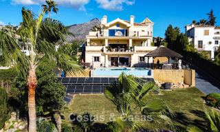 Spacious Mediterranean villa with green fairway views for sale in a privileged golf setting in Nueva Andalucia’s valley, Marbella 778188 