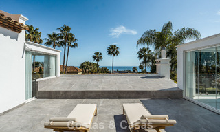 Refined luxury villa in modern Mediterranean style for sale with sea views in a gated complex on Marbella's Golden Mile 778749 