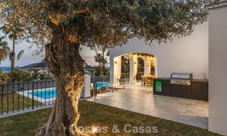 Refined luxury villa in modern Mediterranean style for sale with sea views in a gated complex on Marbella's Golden Mile 778751 