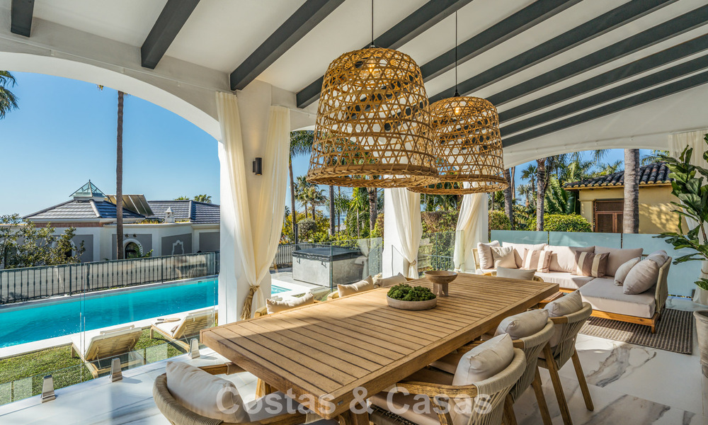 Refined luxury villa in modern Mediterranean style for sale with sea views in a gated complex on Marbella's Golden Mile 778756
