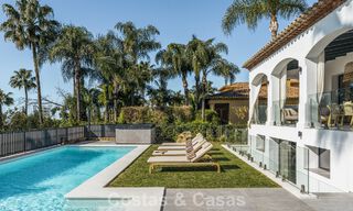 Refined luxury villa in modern Mediterranean style for sale with sea views in a gated complex on Marbella's Golden Mile 778757 