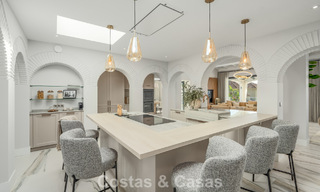 Refined luxury villa in modern Mediterranean style for sale with sea views in a gated complex on Marbella's Golden Mile 778760 