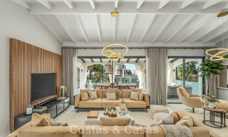 Refined luxury villa in modern Mediterranean style for sale with sea views in a gated complex on Marbella's Golden Mile 778761 