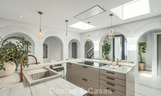 Refined luxury villa in modern Mediterranean style for sale with sea views in a gated complex on Marbella's Golden Mile 778764 