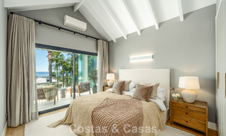 Refined luxury villa in modern Mediterranean style for sale with sea views in a gated complex on Marbella's Golden Mile 778769 