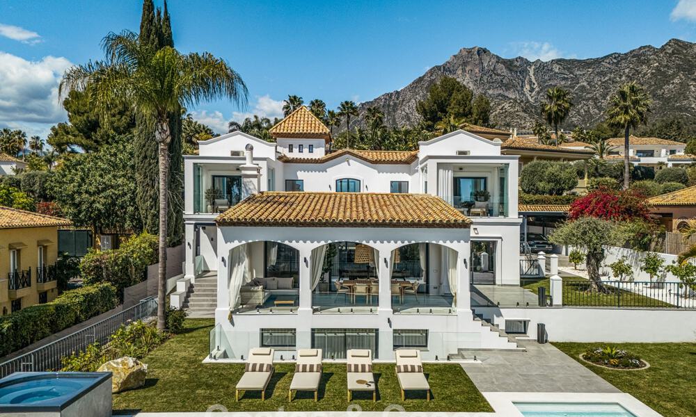 Refined luxury villa in modern Mediterranean style for sale with sea views in a gated complex on Marbella's Golden Mile 778770